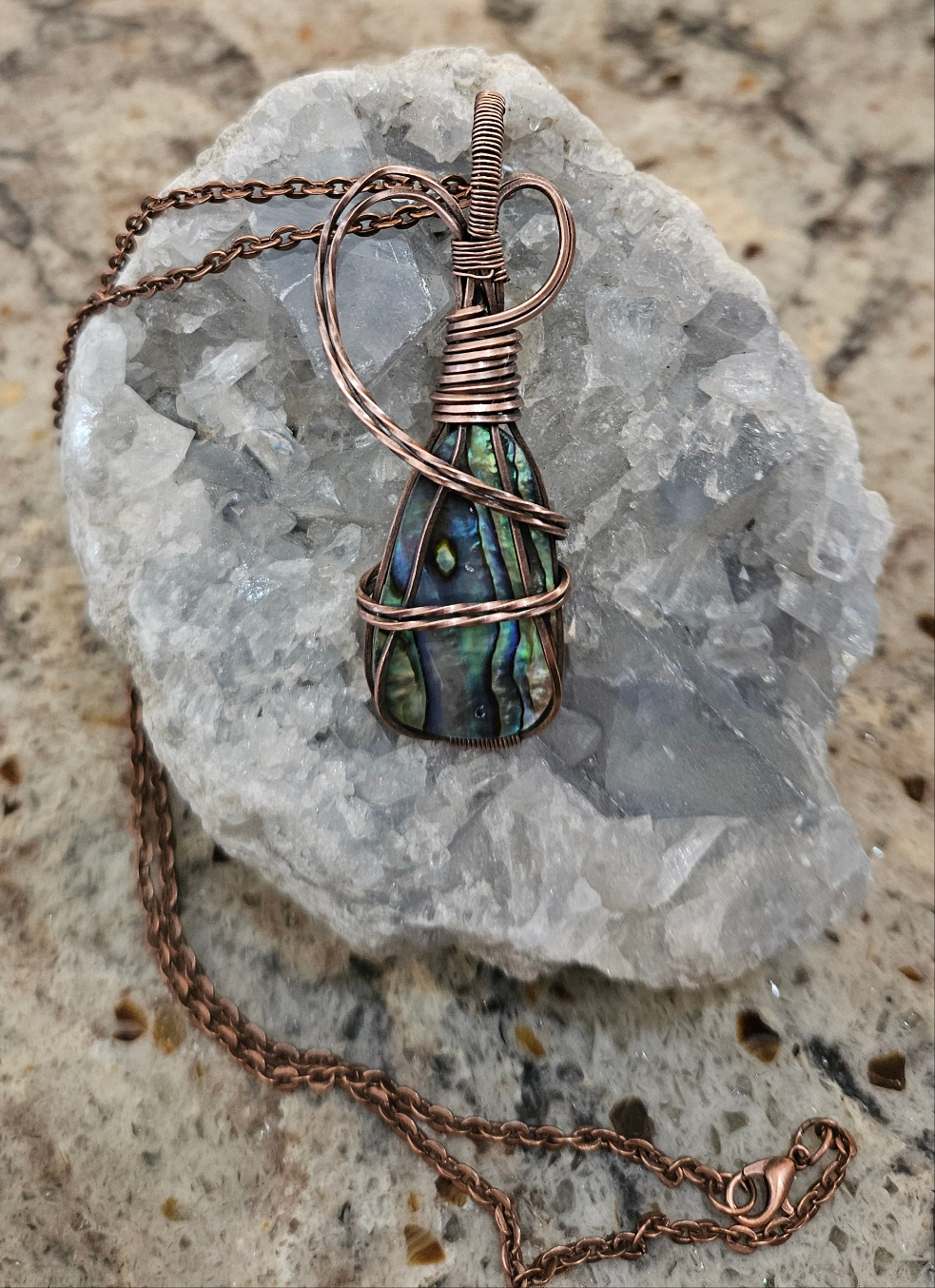 Abalone wrapped in aged copper