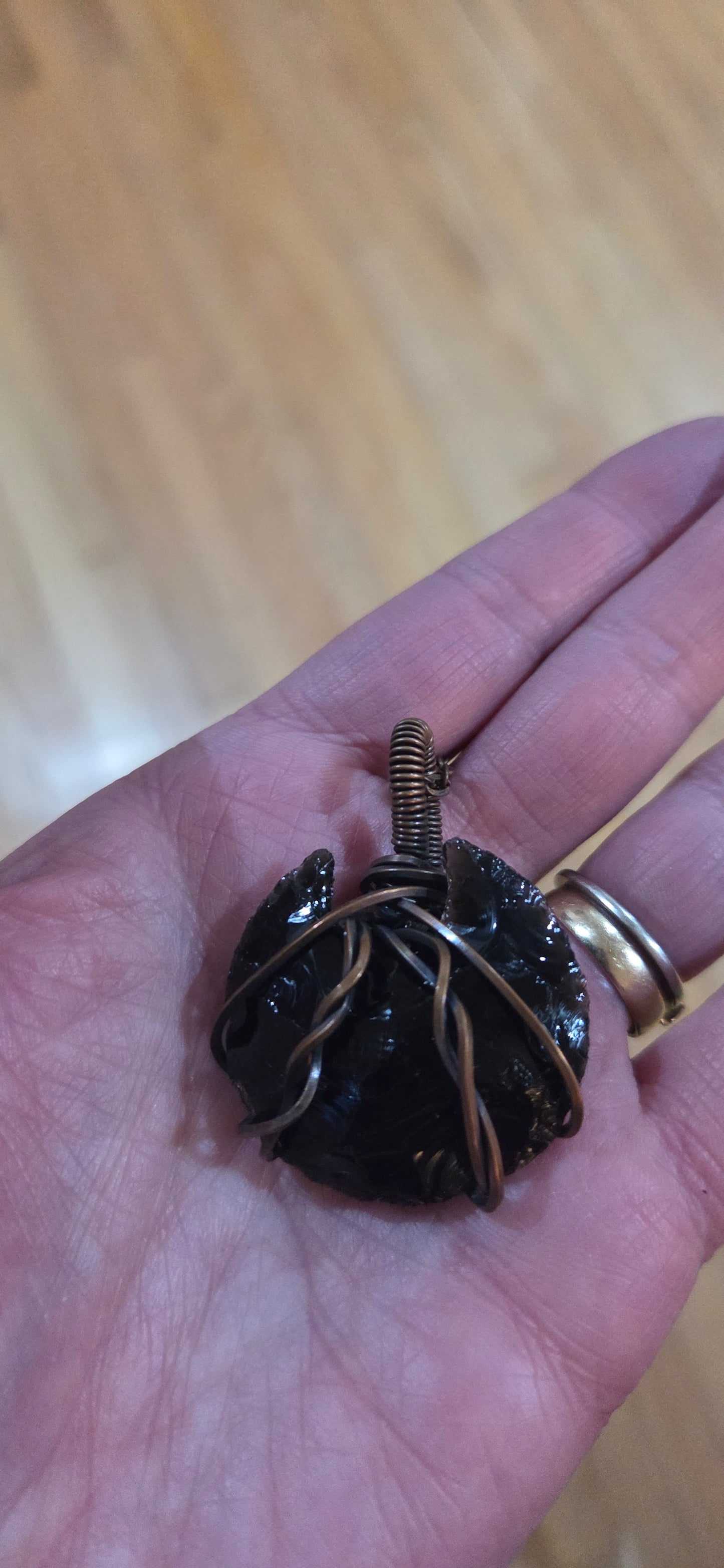 Obsidian moon wrapped in copper