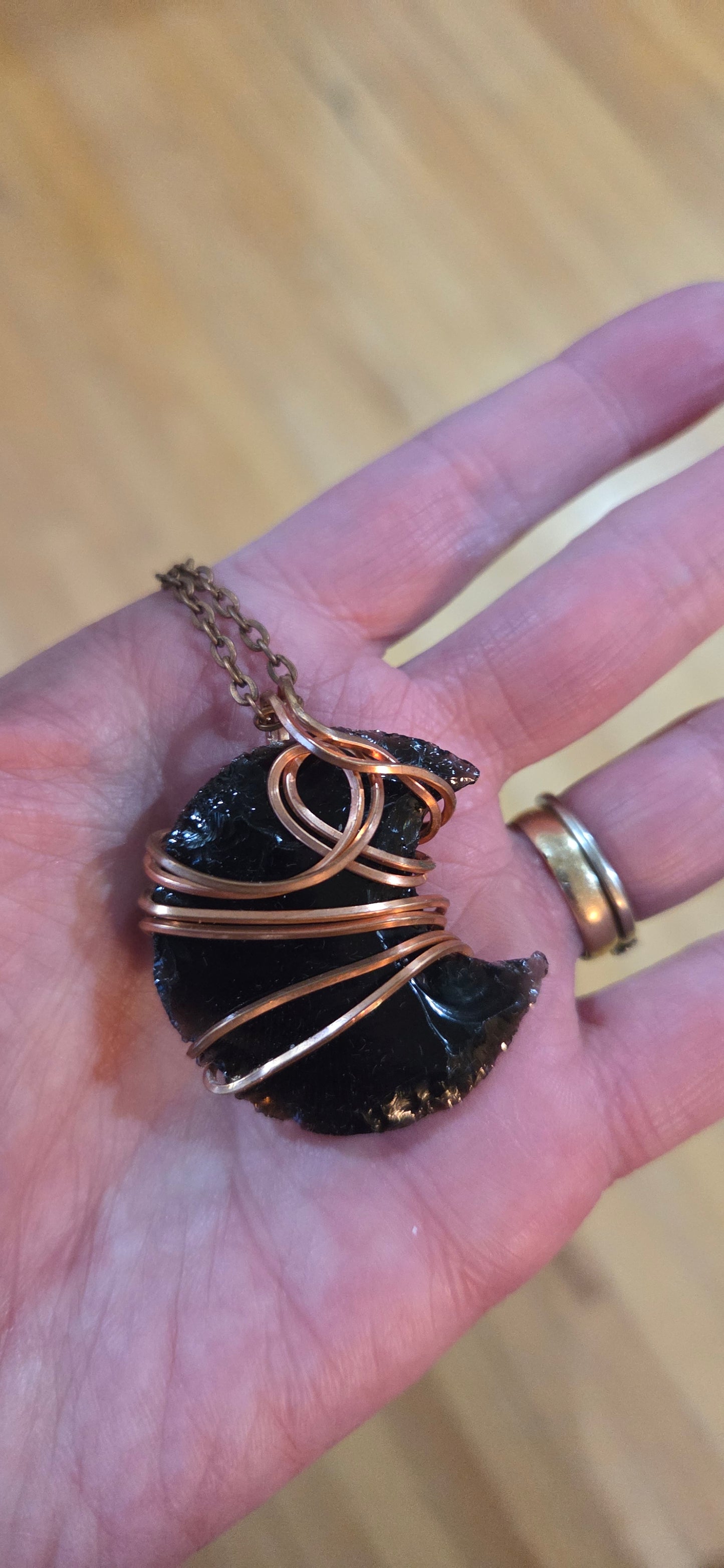 Obsidian moon wrapped in copper