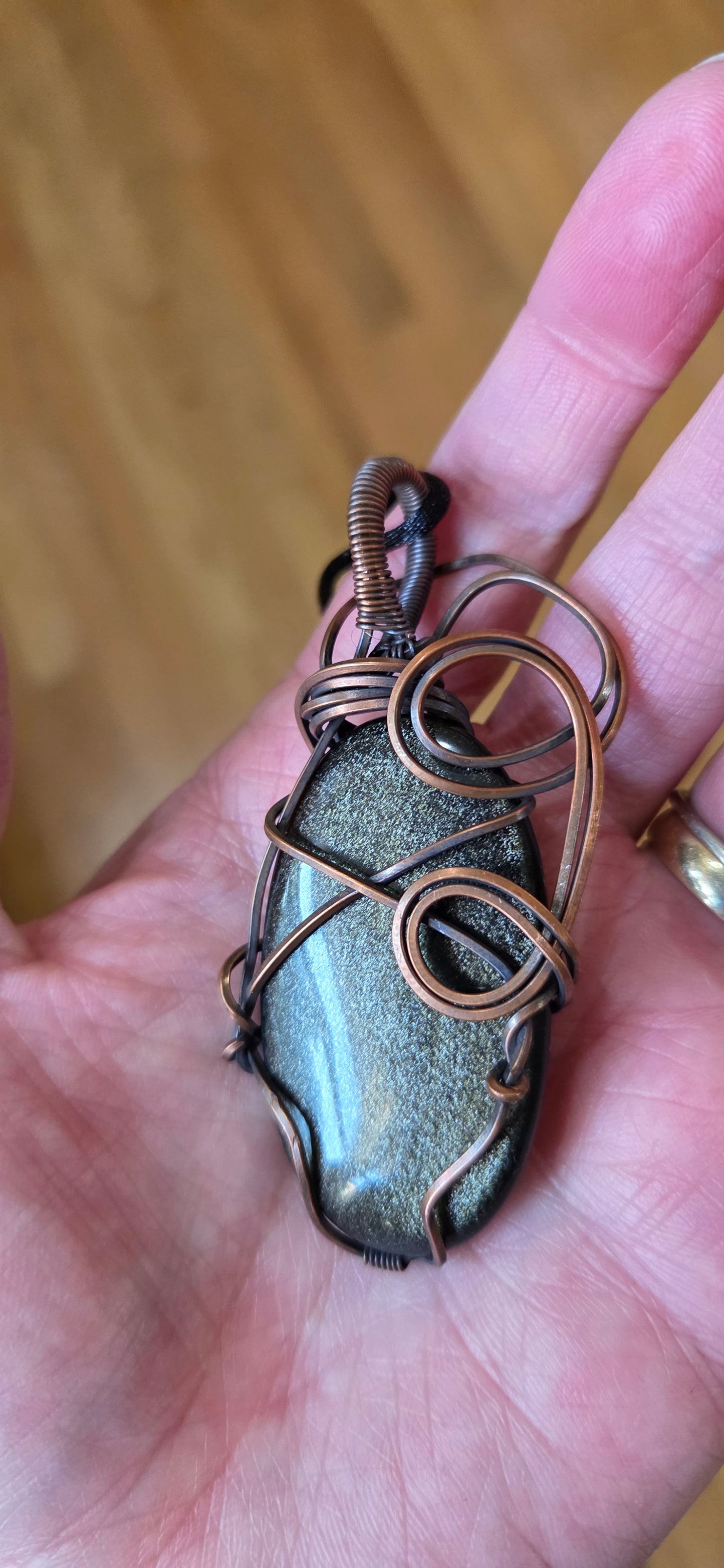 Gold Sheen Obsidian pendant wrapped in copper
