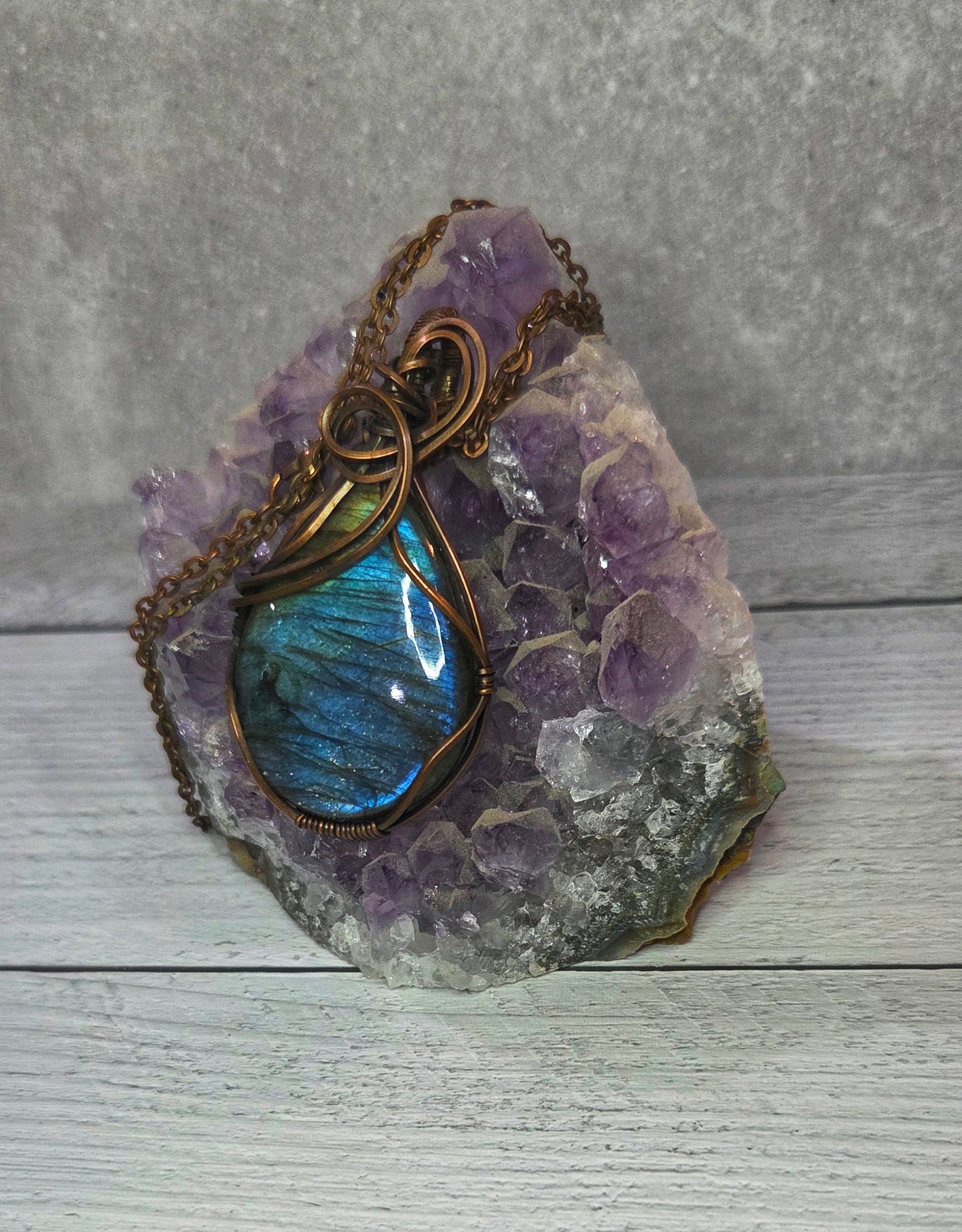 Labradorite wrapped in aged copper