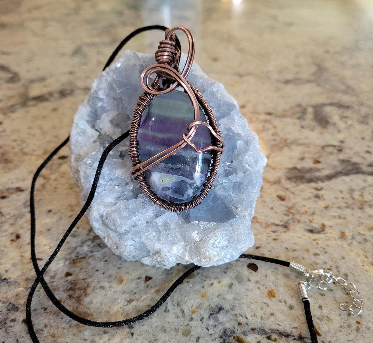 Fluorite wrapped in aged copper