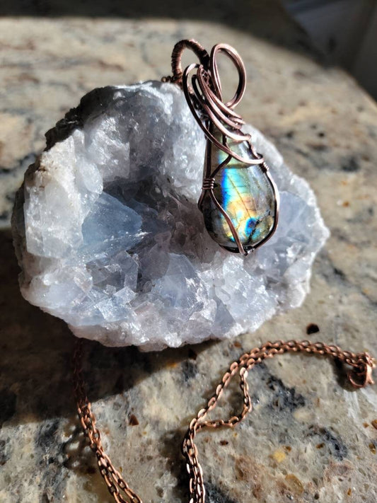 Labradorite pendant wrapped in aged copper