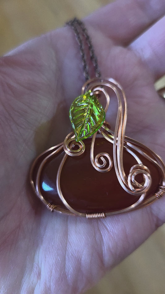 Carnelian Pumpkin pendant wrapped in copper