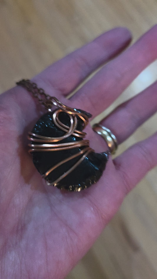 Obsidian moon wrapped in copper