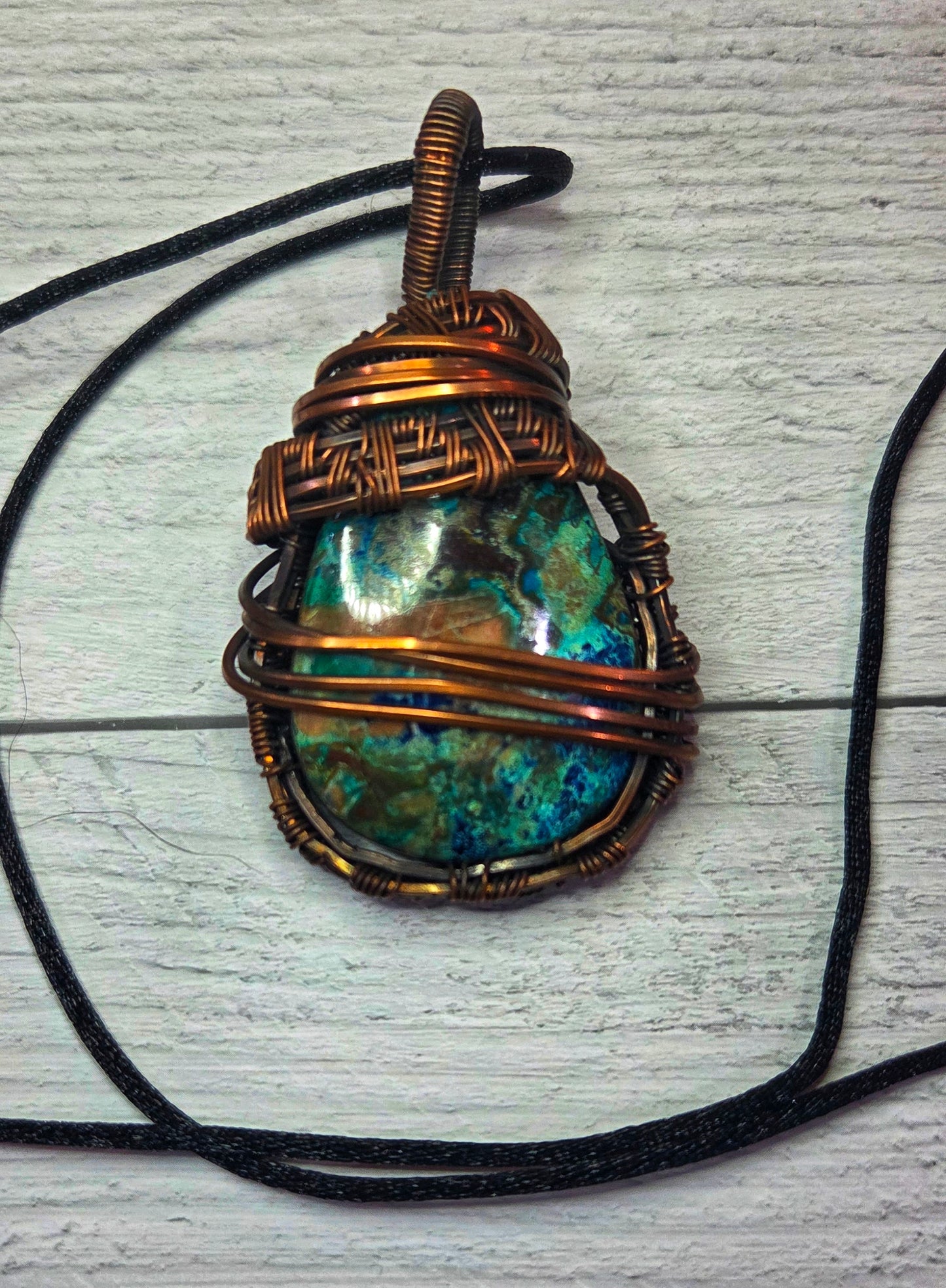 Chrysocolla wrapped in aged copper