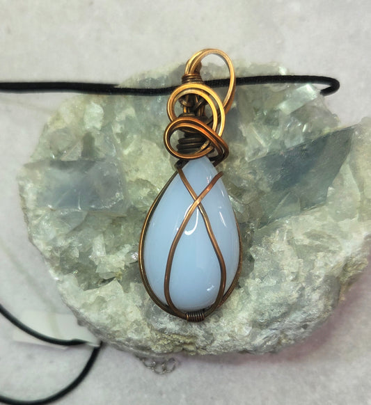 Chalcedony wrapped in aged copper