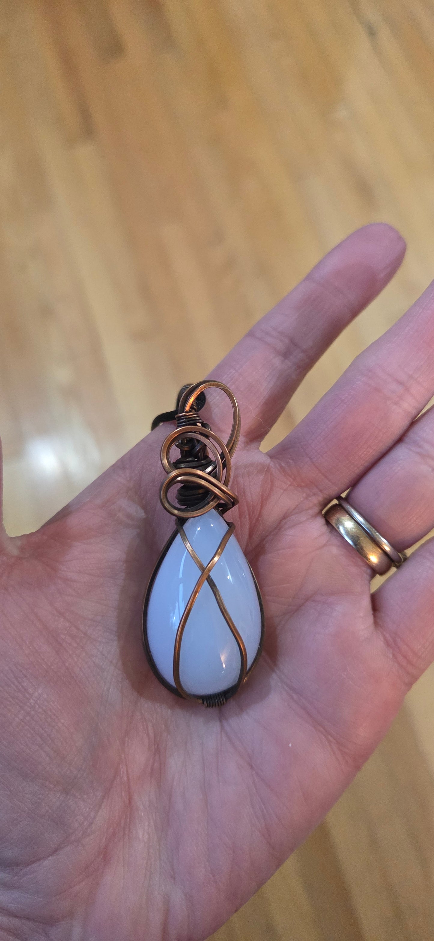 Chalcedony wrapped in aged copper