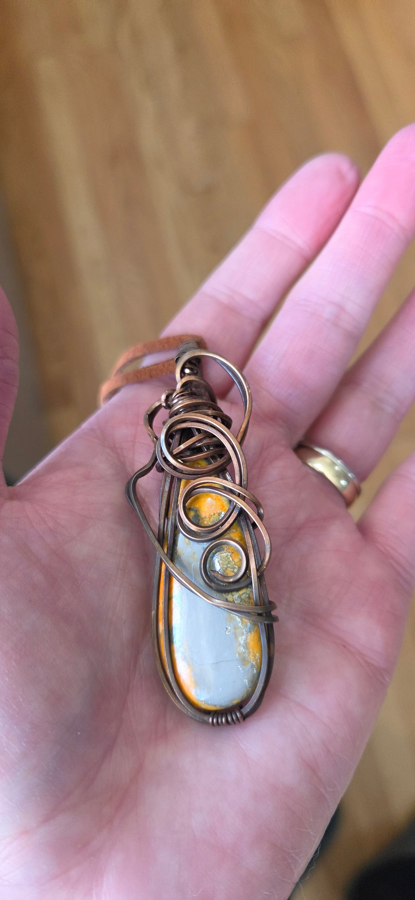 Bumblebee Jasper wrapped in aged copper comes on a cord