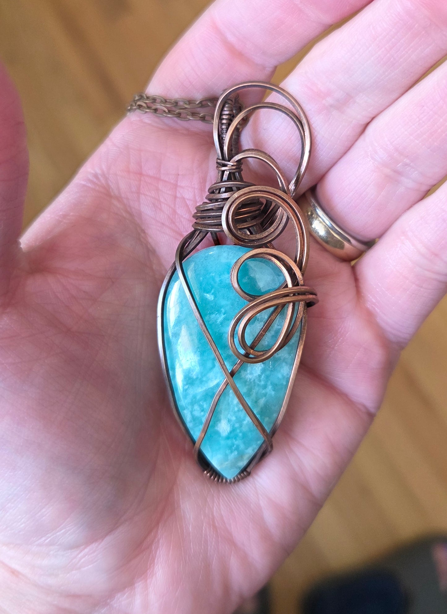 Green Aventurine wrapped in aged copper